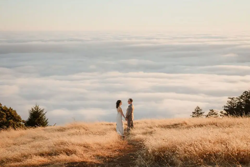Newlyweds framed by the Northern California coast