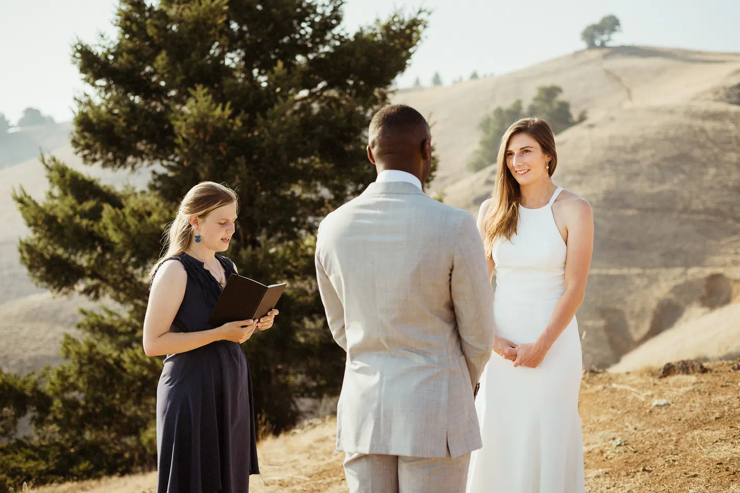 A couple exchanging vows during a small Mount Tam elopement ceremony