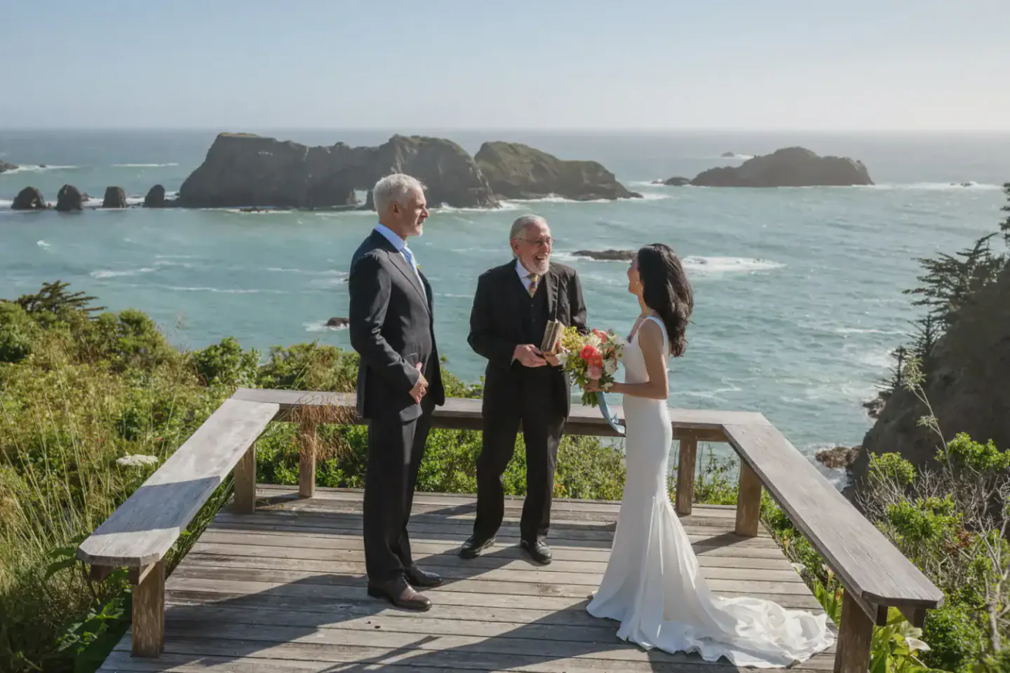 A couple exchanging private vows beside the ocean on the Mendocino coast
