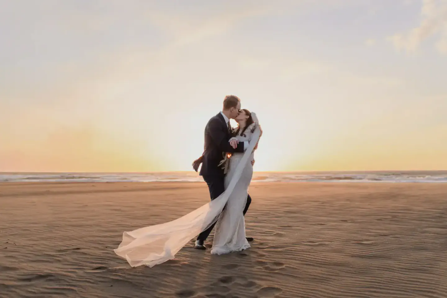 A newly married couple together at Ocean Beach after their San Francisco elopement