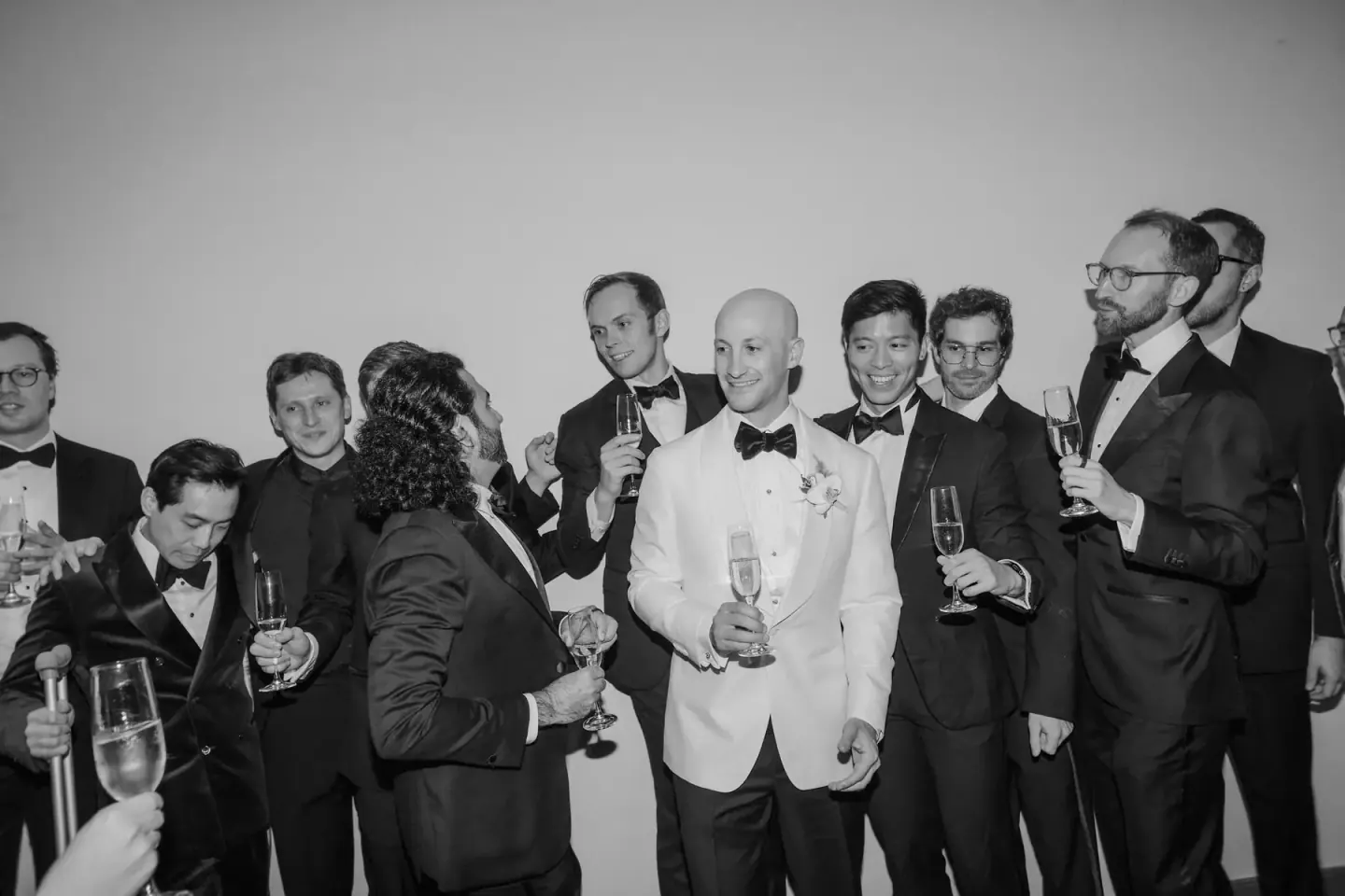 The groom surrounded by groomsmen in a San Francisco Wedding