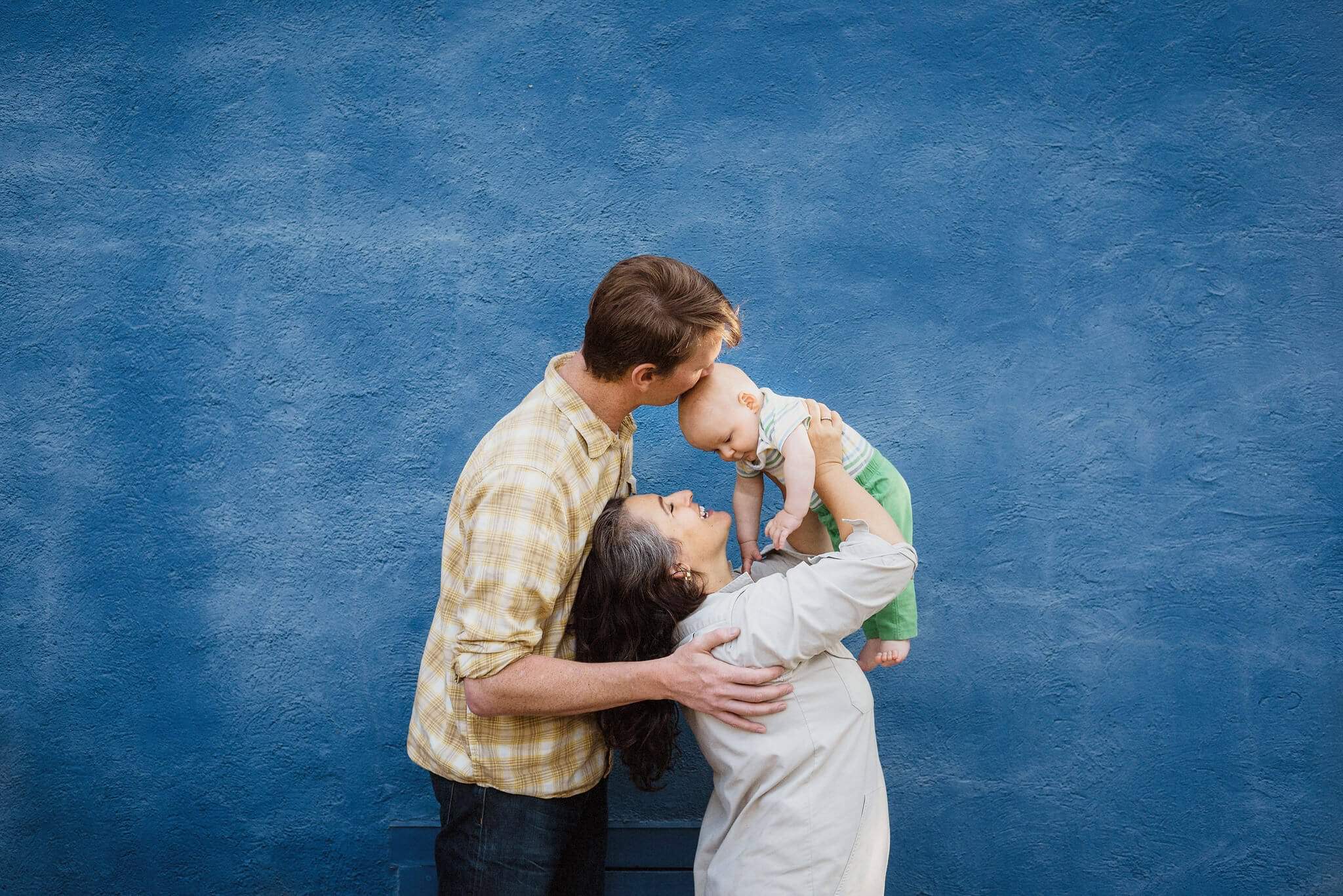 A family sharing a quiet moment during a documentary session