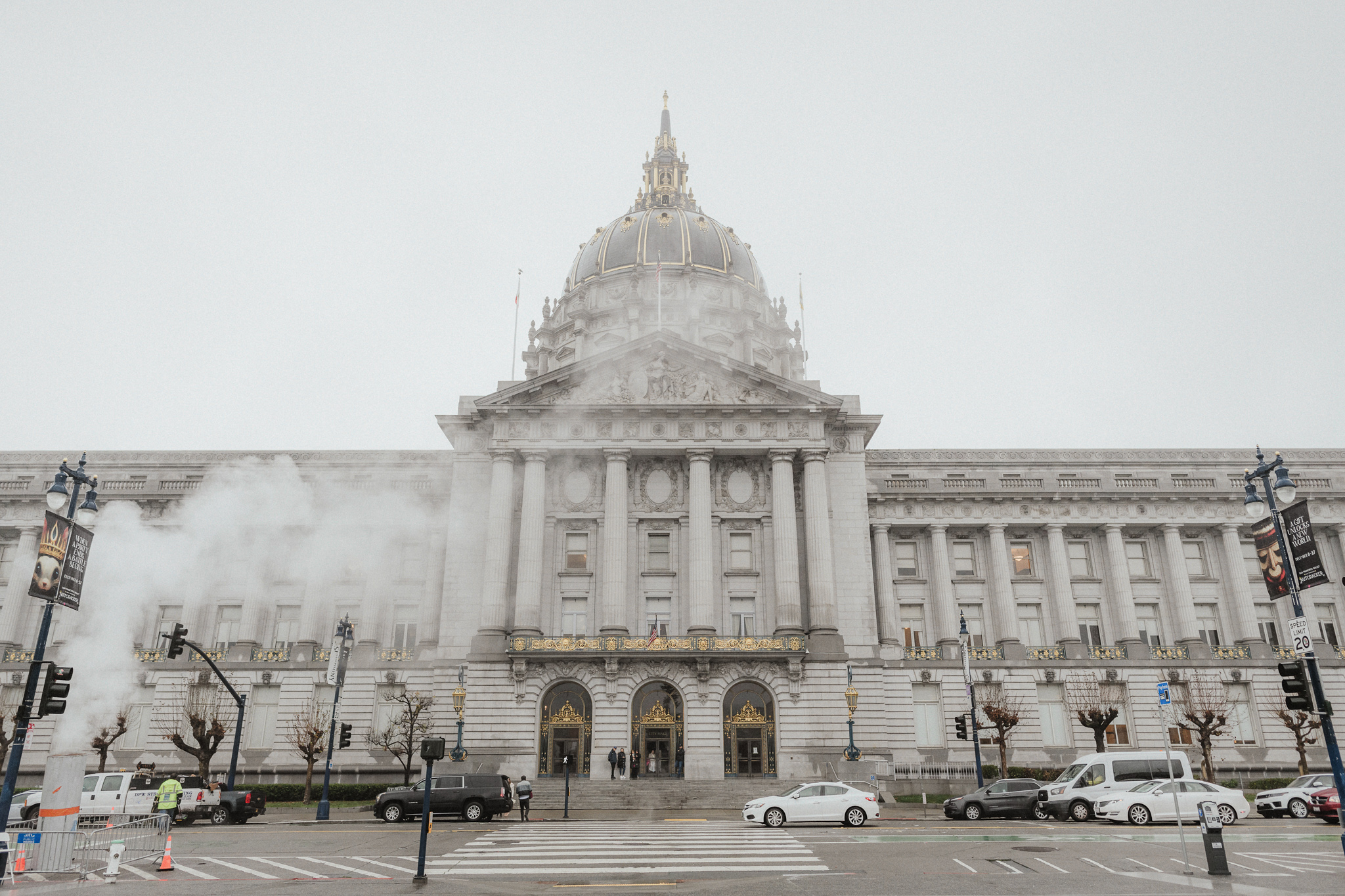 The exterior of San Francisco City Hall on an overcast wedding day
