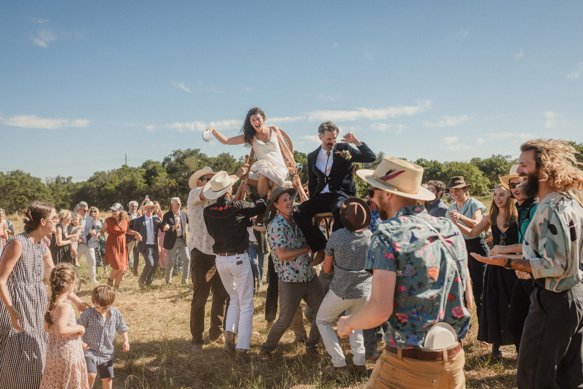 A couple laughing together during a multicultural wedding