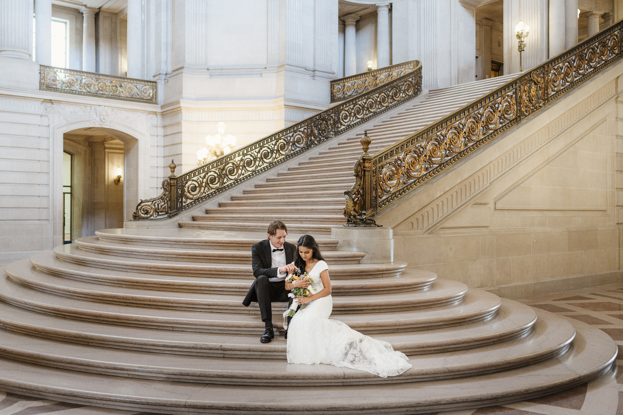 Newlyweds leaving San Francisco City Hall after their ceremony