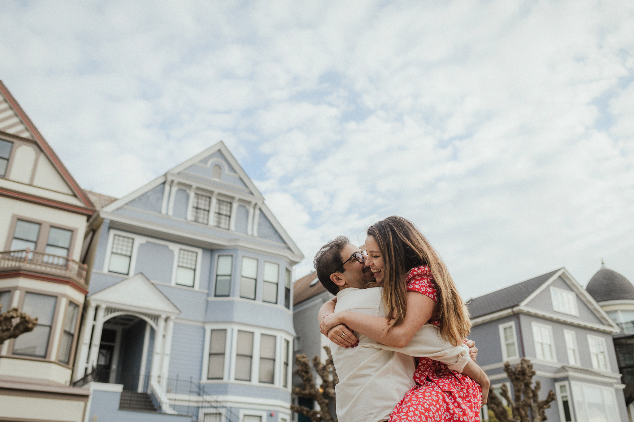 A couple framed by San Francisco architecture