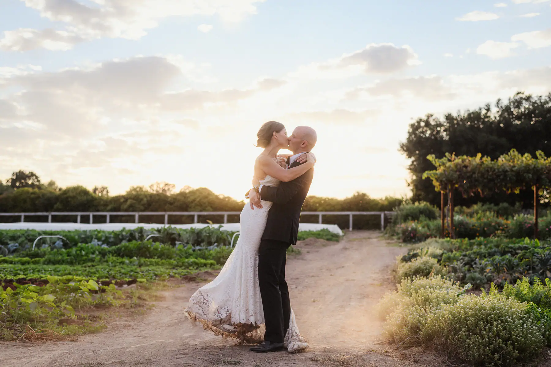 Newlyweds together in the gardens at Roblar Farm in Santa Ynez